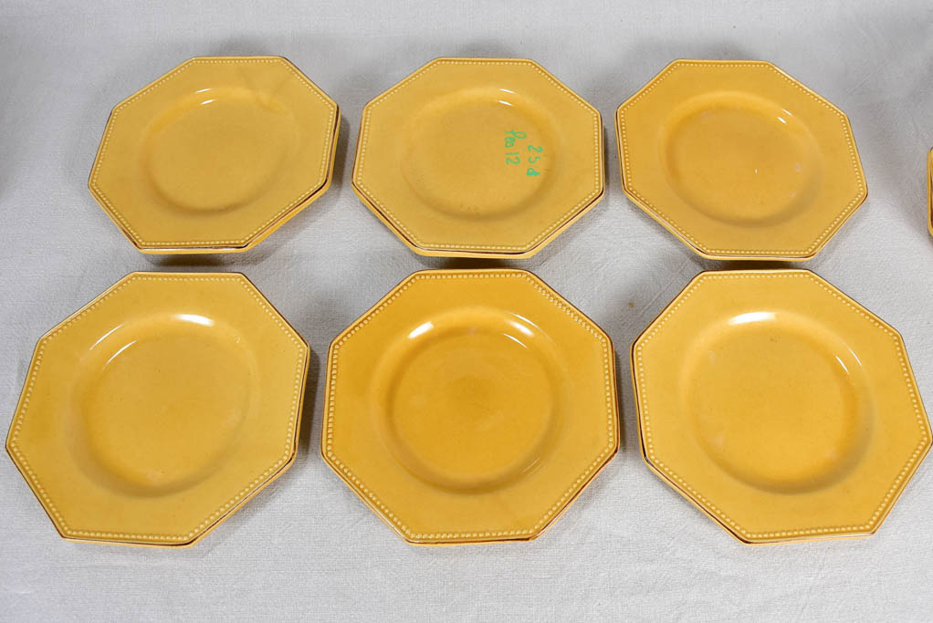 Collection of 12 octagonal plates with yellow ocher glaze 9½"