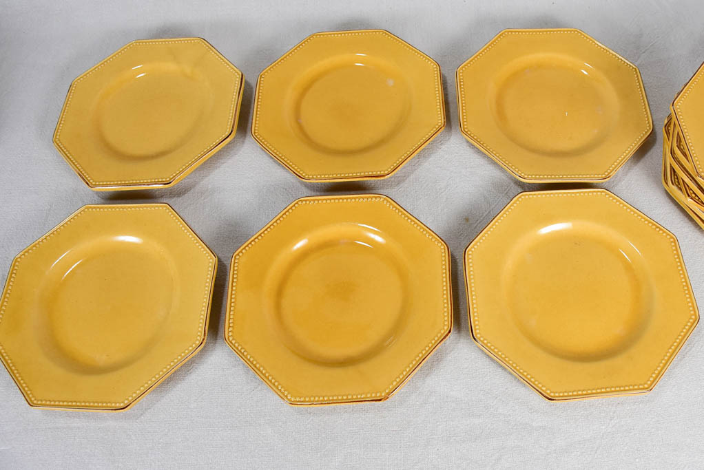 Collection of 12 octagonal plates with yellow ocher glaze 9½"