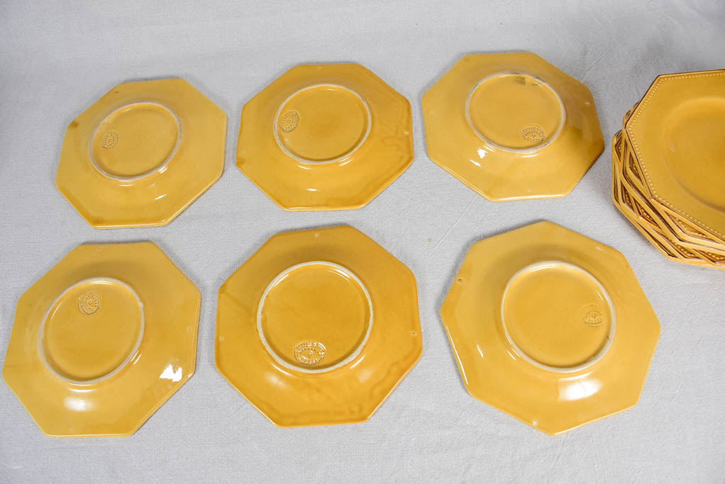 Collection of 12 octagonal plates with yellow ocher glaze 9½"