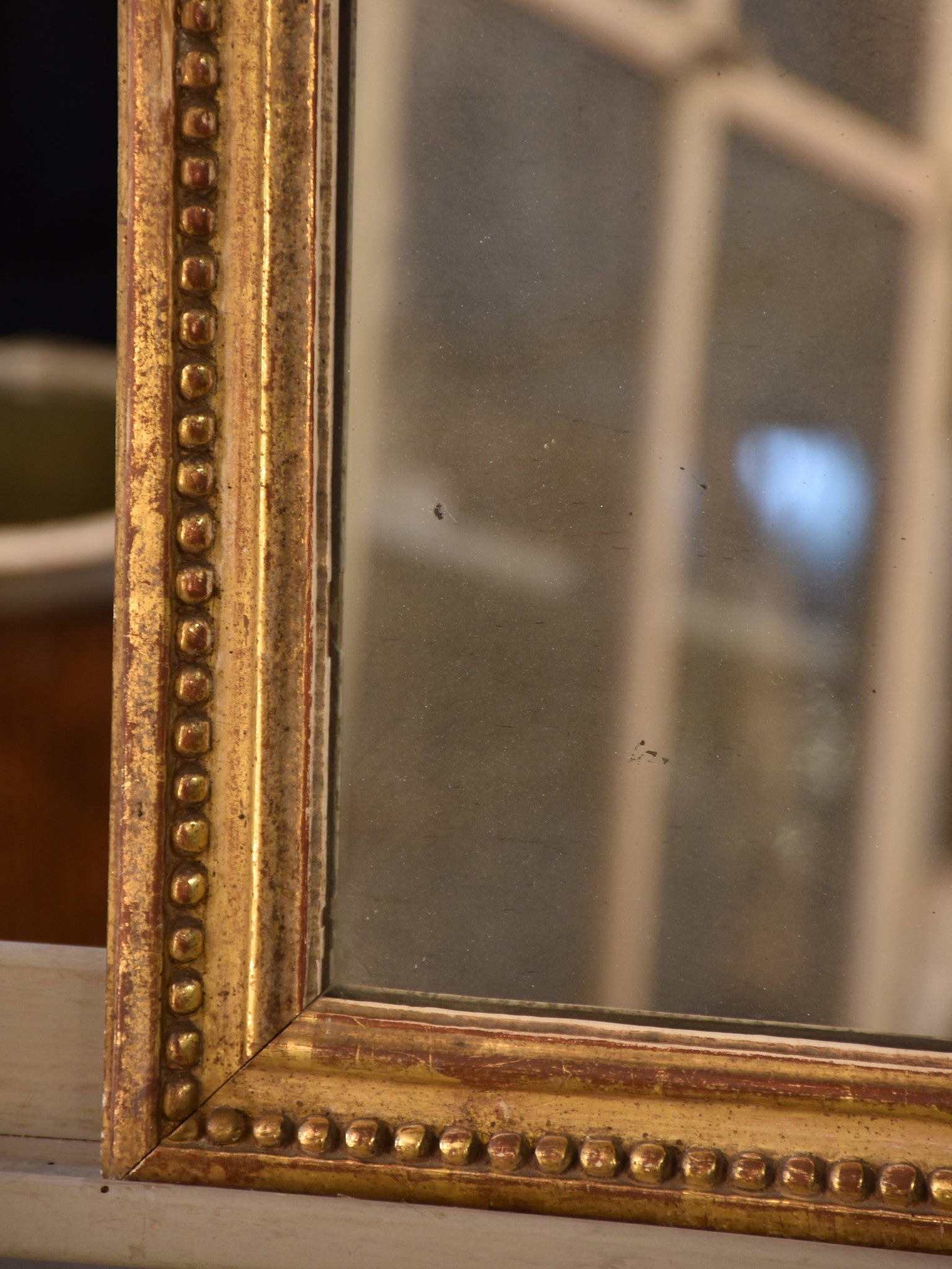 Petite early 19th century gilded French mirror