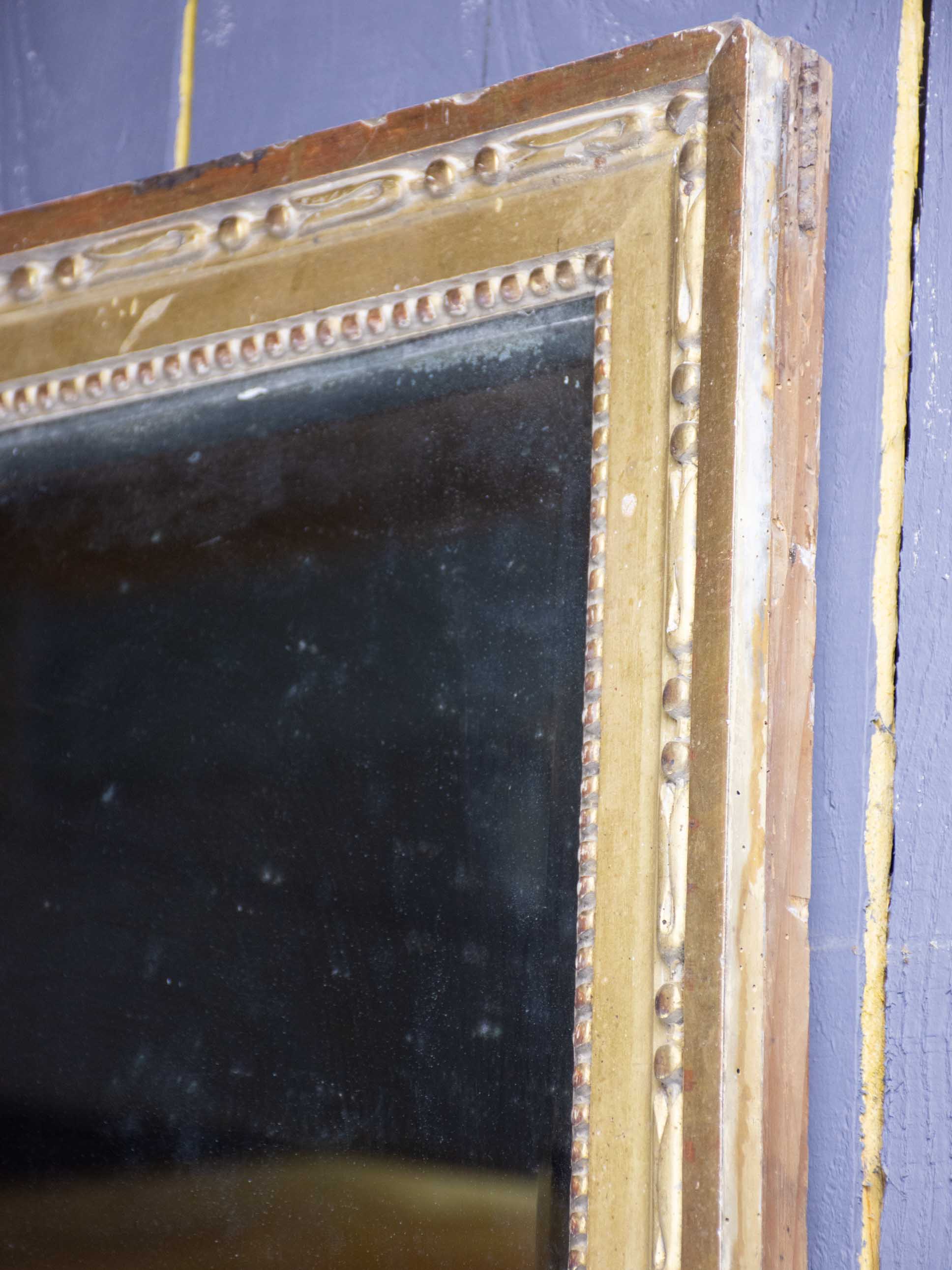 Louis XVI mirror with gilded frame and mercury glass