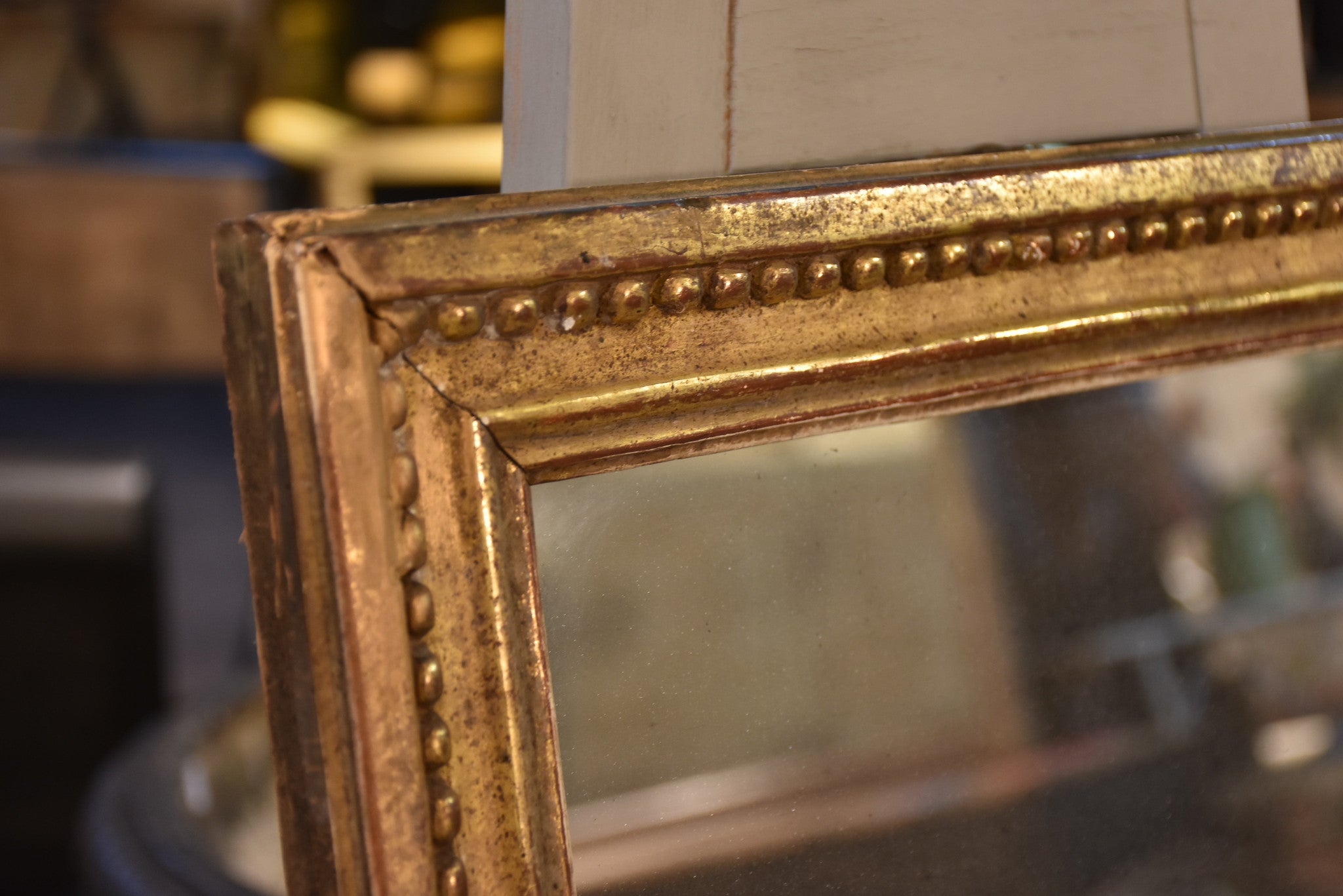 Petite early 19th century gilded French mirror