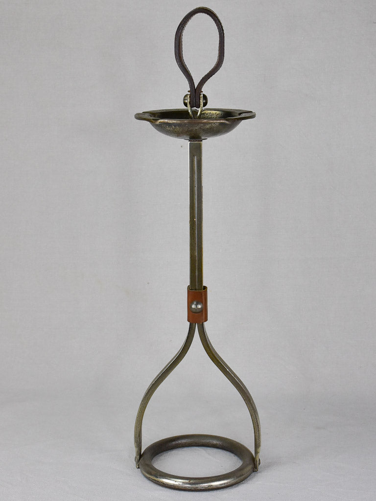 1960's wrought iron standard ashtray with leather carry handle 28"