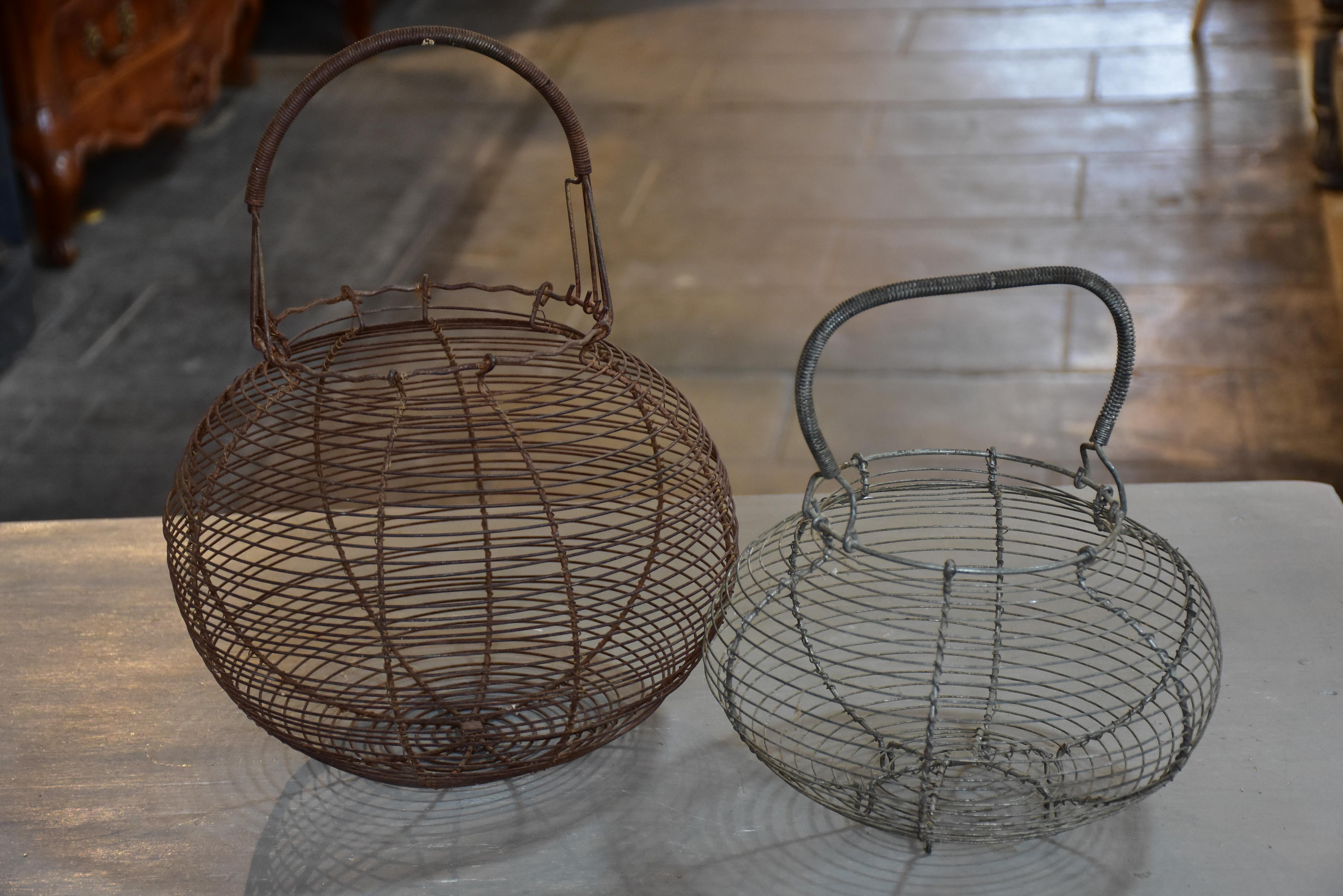 Two antique French wire baskets