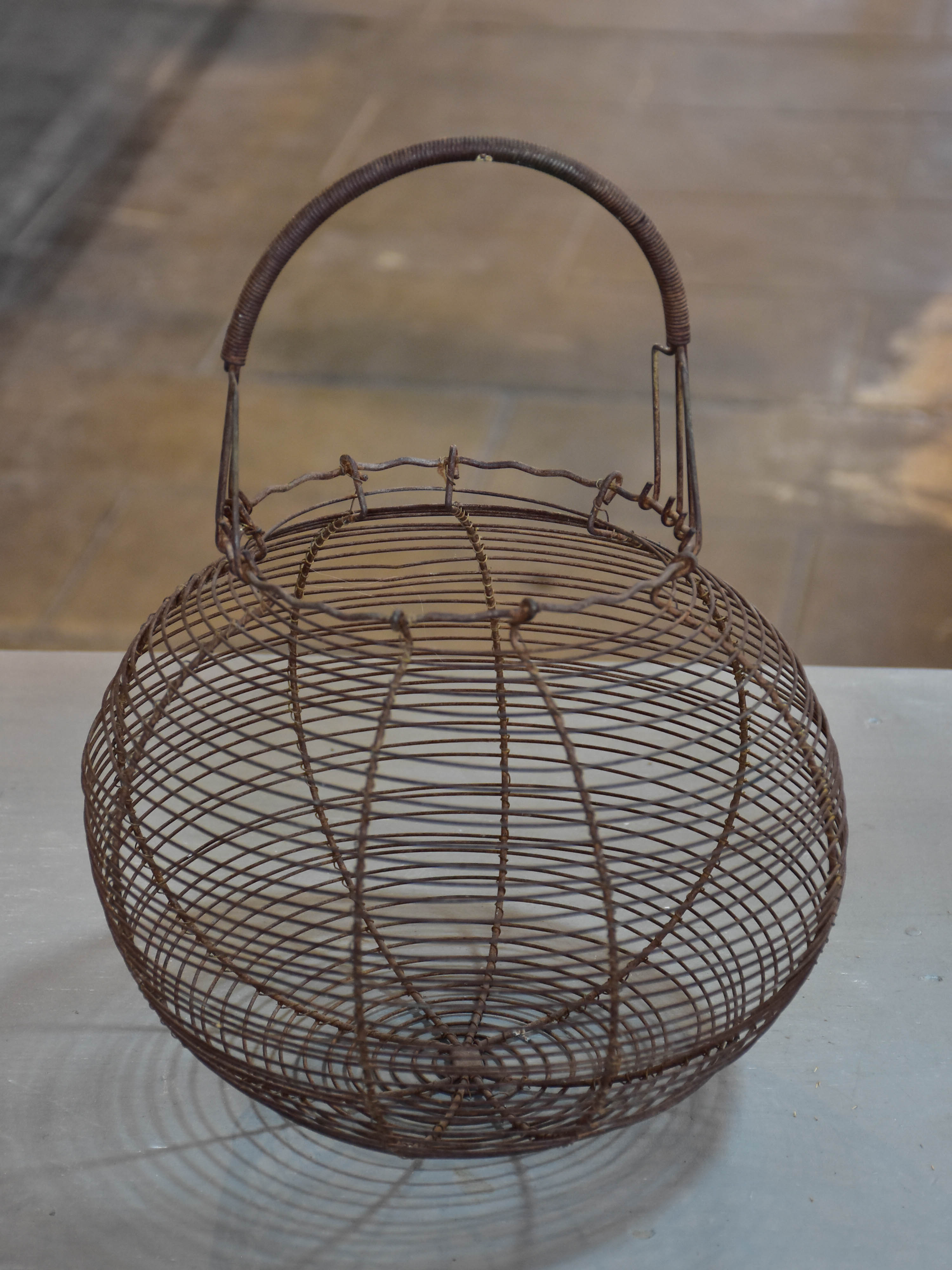 Two antique French wire baskets