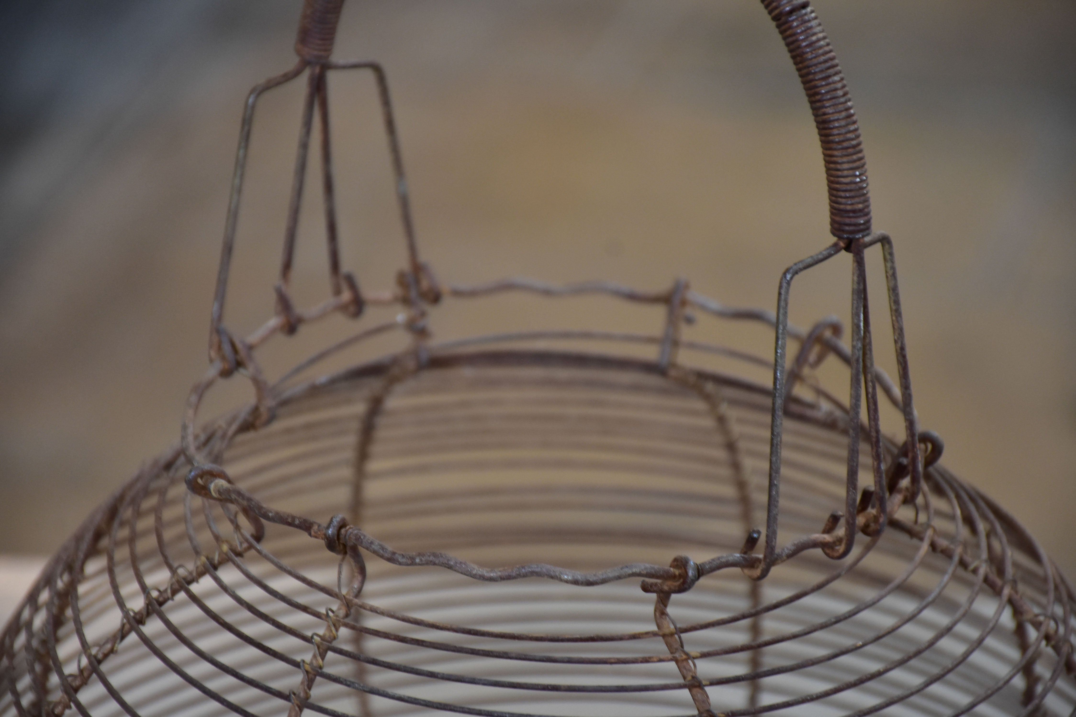 Two antique French wire baskets