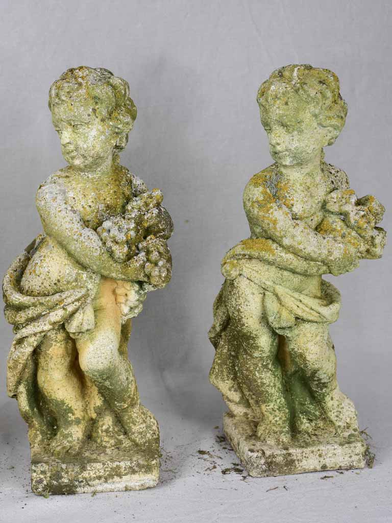 Collection of four vintage cherubs representing the four seasons - weathered patina 19¼"