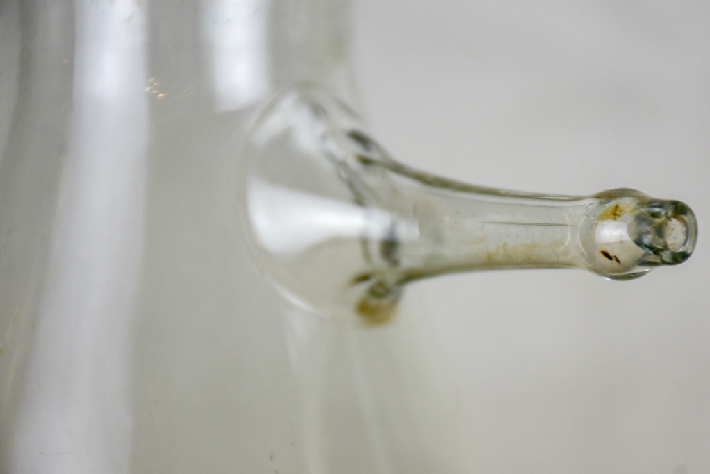 Two large vintage glass flasks from a laboratory