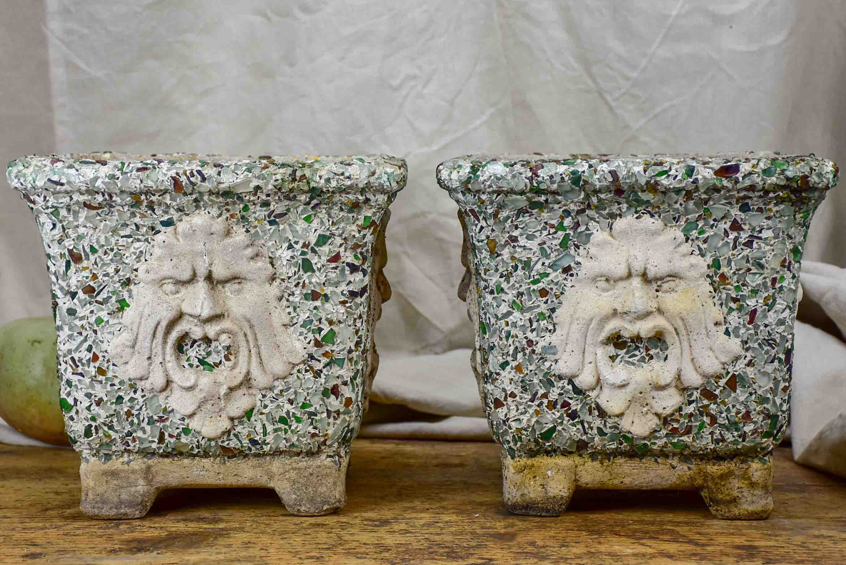 Pair of mid-century garden planters with masquerade