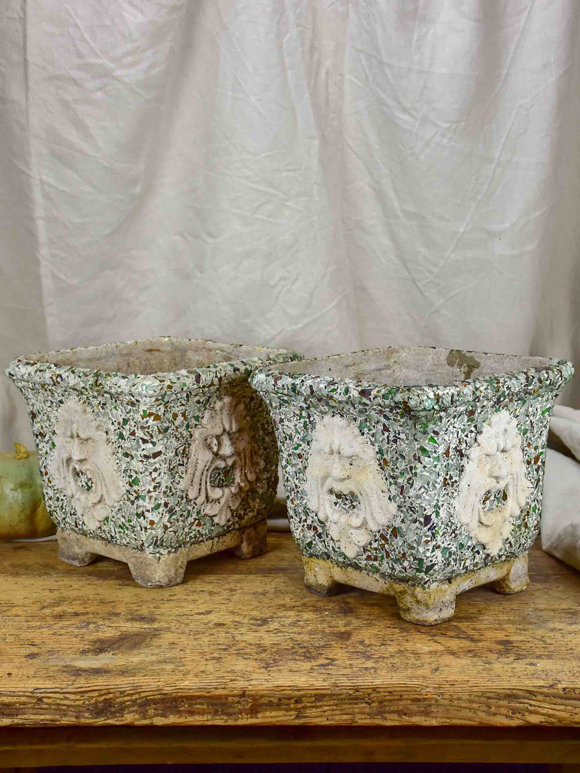 Pair of mid-century garden planters with masquerade