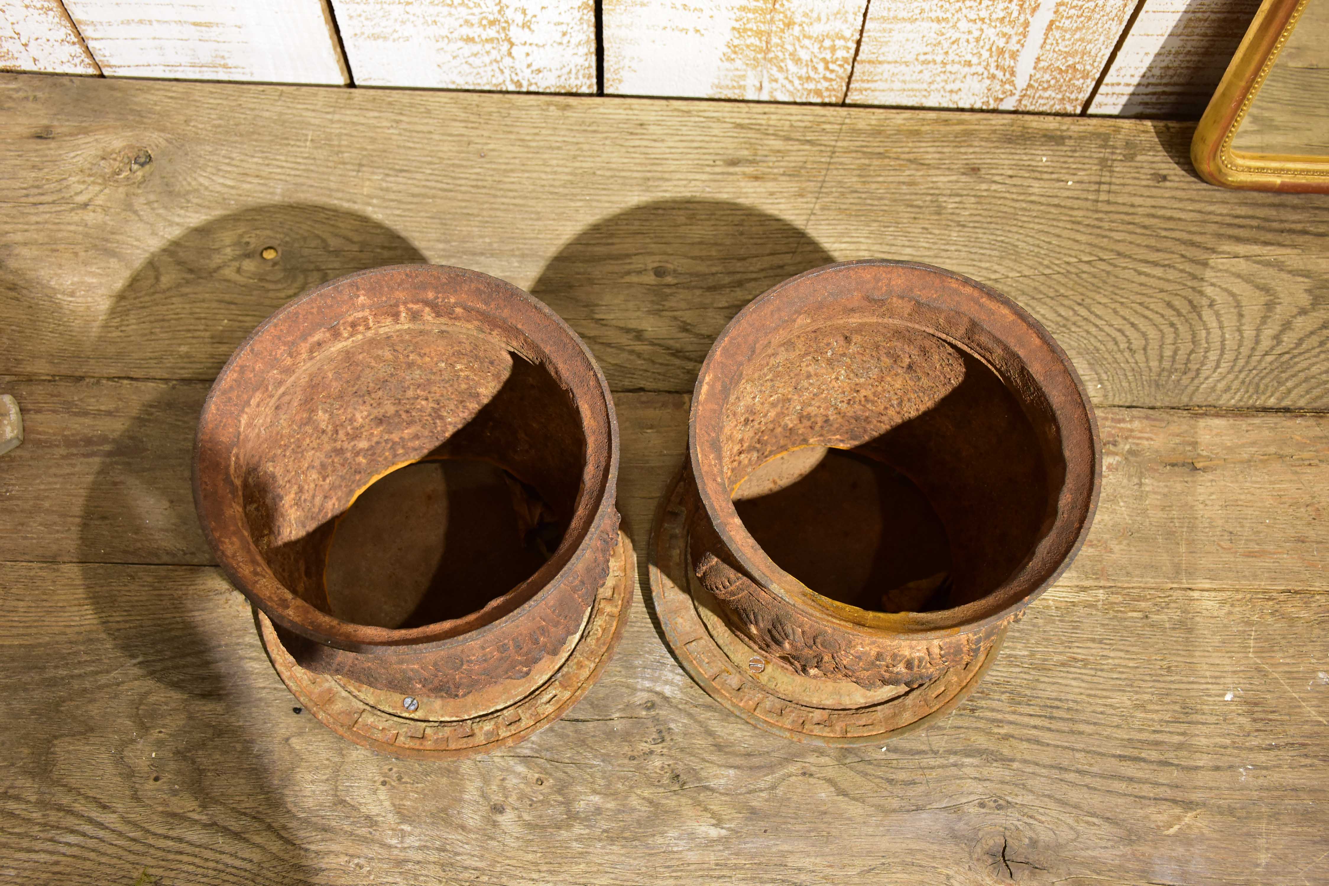 Pair of antique French cast iron planters / pot stands