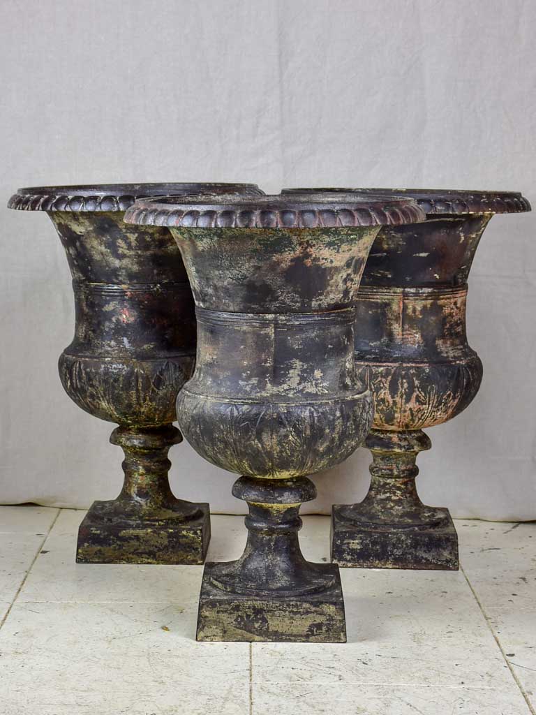 Two 19th Century cast iron Medici urns - black