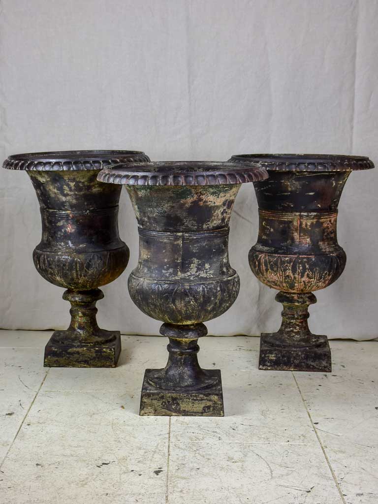 Two 19th Century cast iron Medici urns - black