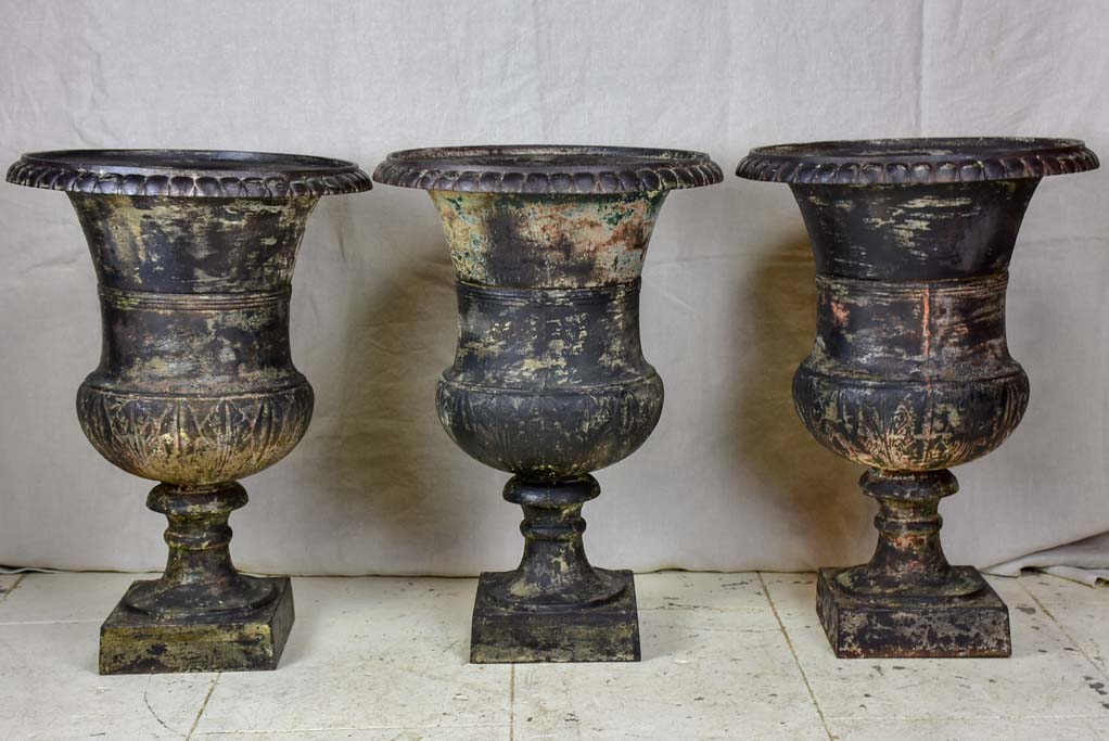 Two 19th Century cast iron Medici urns - black