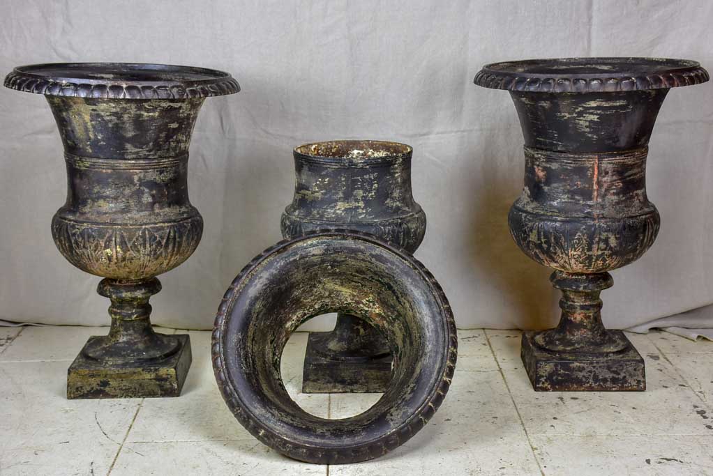 Two 19th Century cast iron Medici urns - black