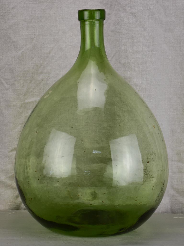 Antique French demijohn bottle - green