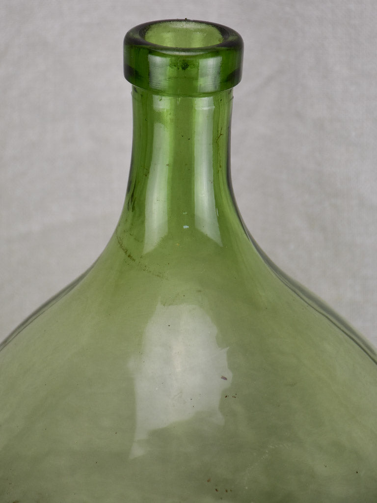 Antique French demijohn bottle - green