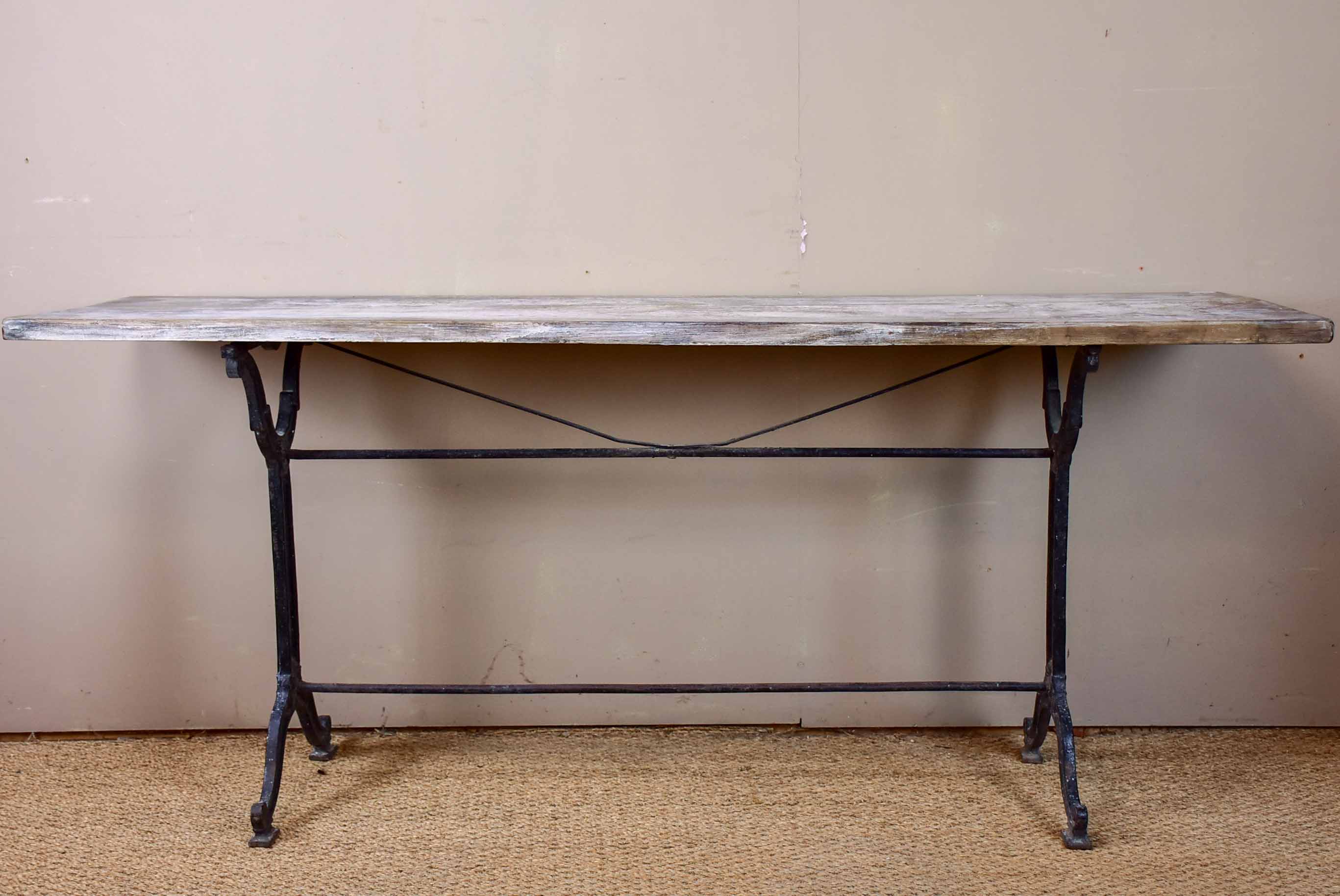 Antique French bistro table with oak top and cast iron base