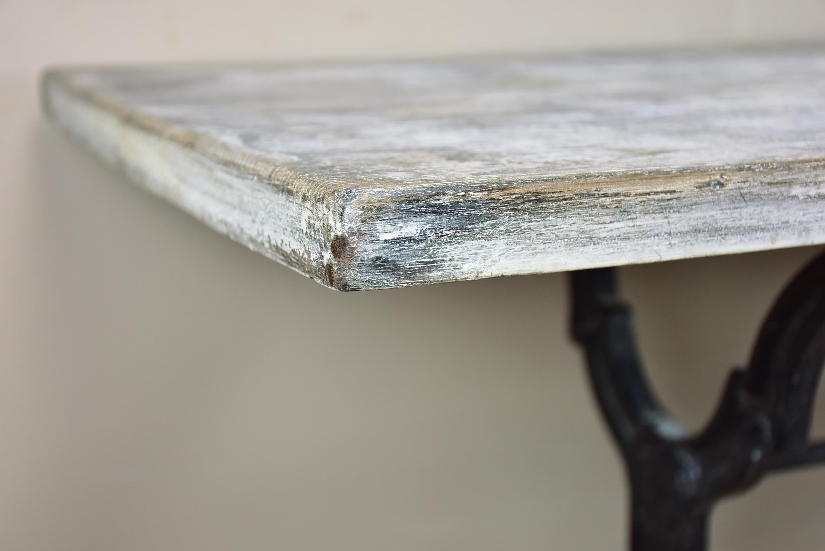 Antique French bistro table with oak top and cast iron base