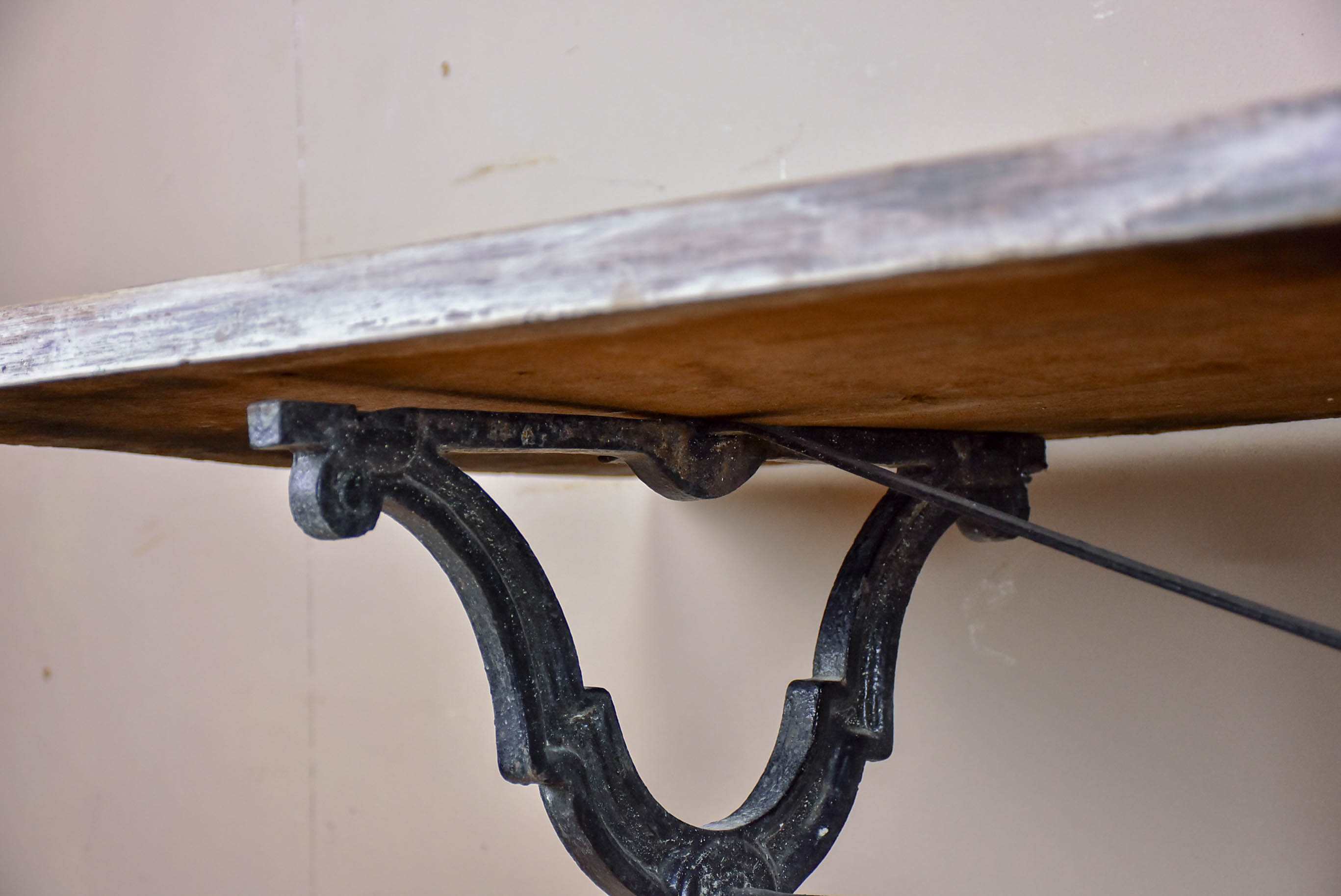 Antique French bistro table with oak top and cast iron base