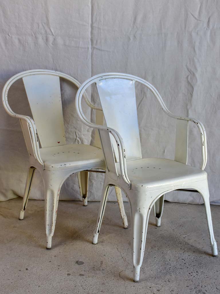 Pair of white Tolix armchairs - 1950's