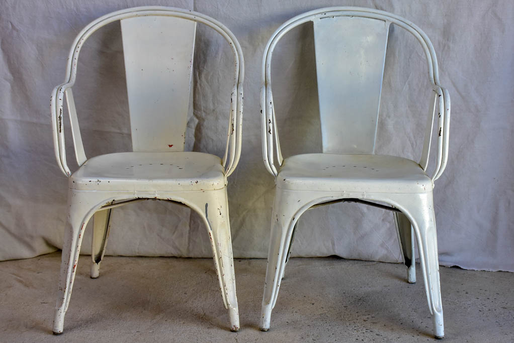 Pair of white Tolix armchairs - 1950's