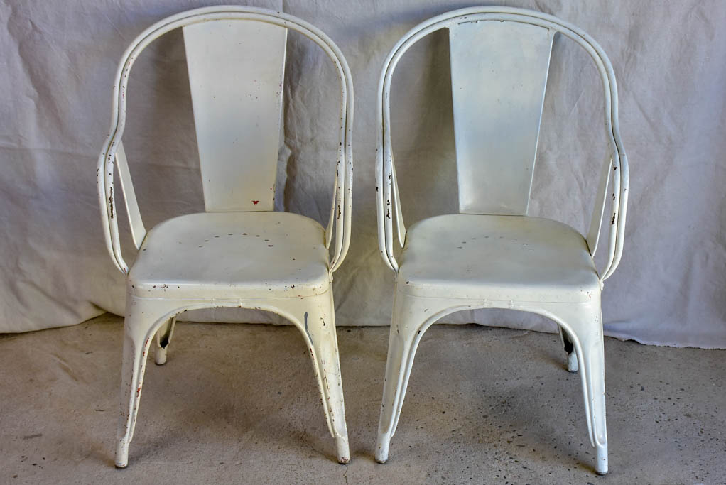 Pair of white Tolix armchairs - 1950's