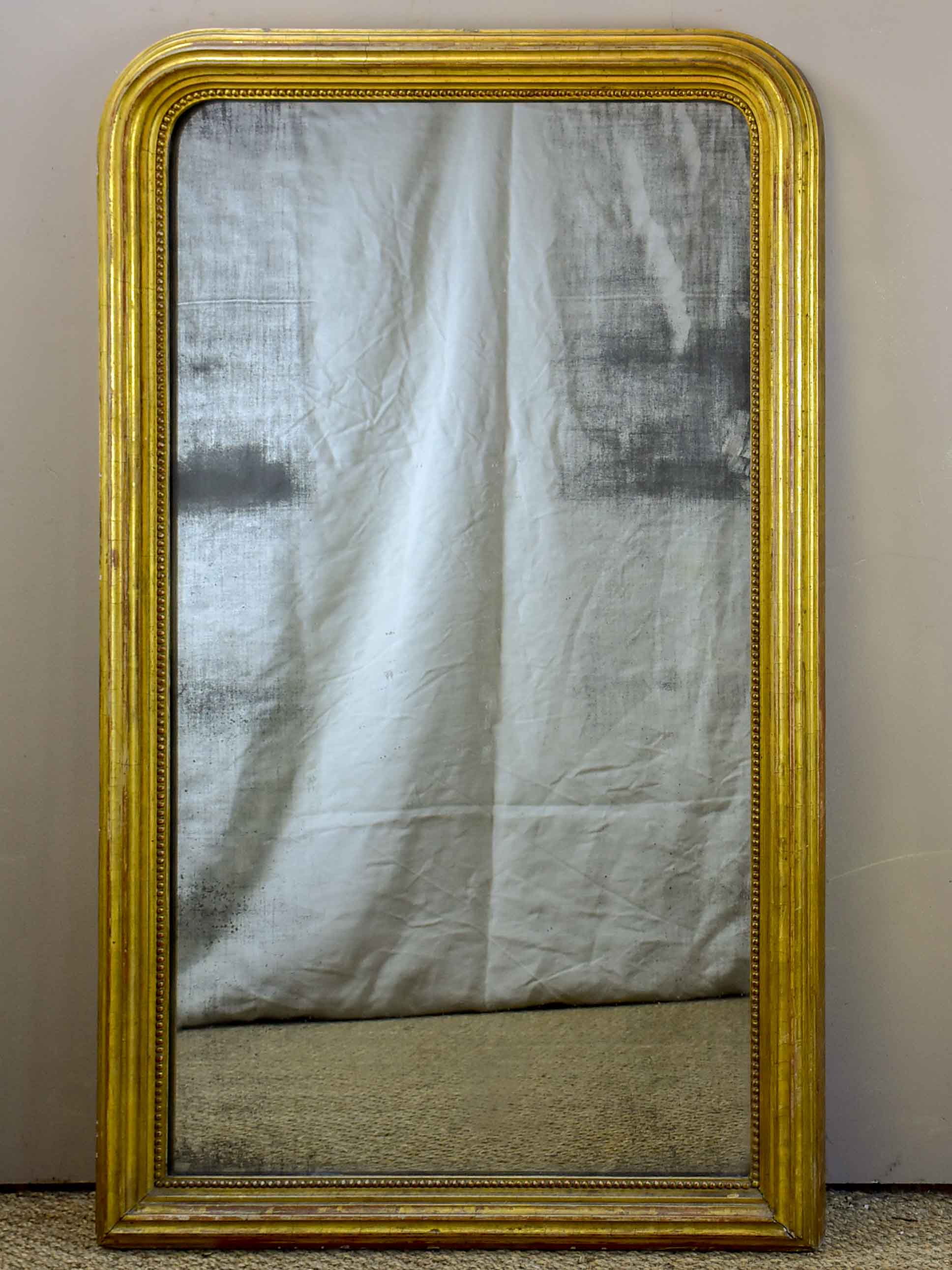 Large French Louis Philippe mirror with aged glass