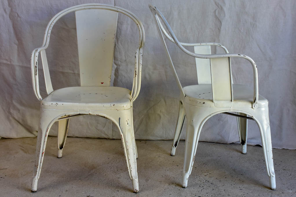 Pair of white Tolix armchairs - 1950's