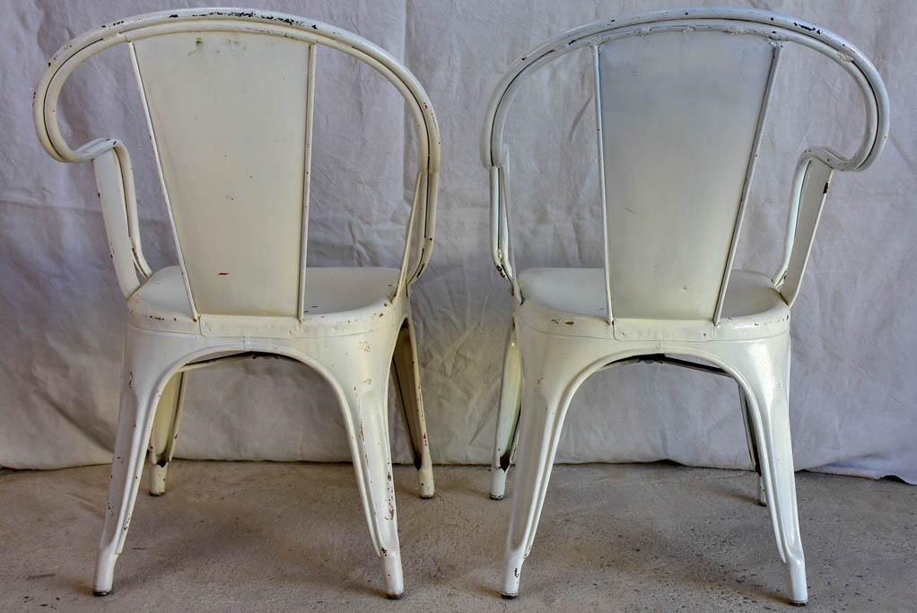 Pair of white Tolix armchairs - 1950's