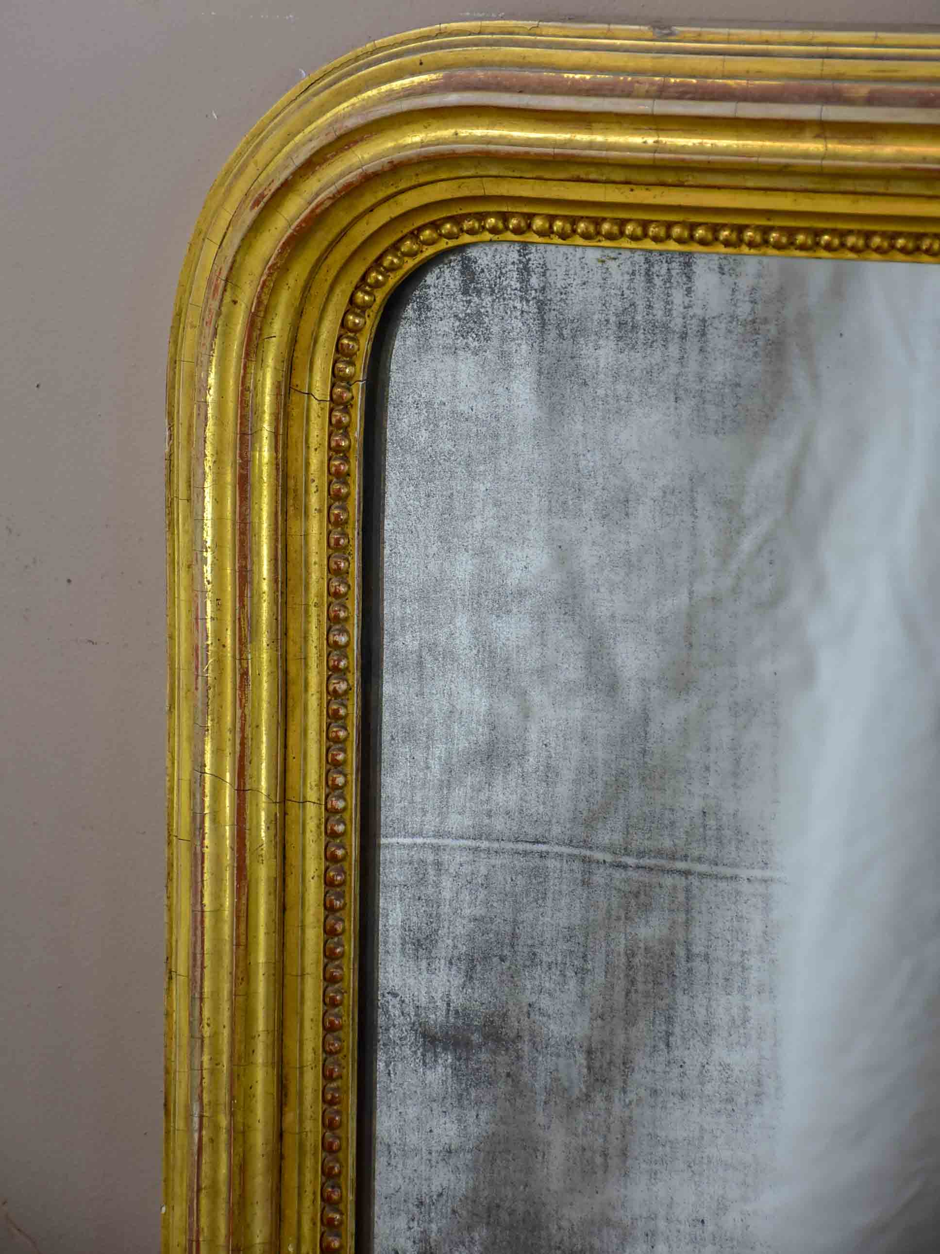 Large French Louis Philippe mirror with aged glass