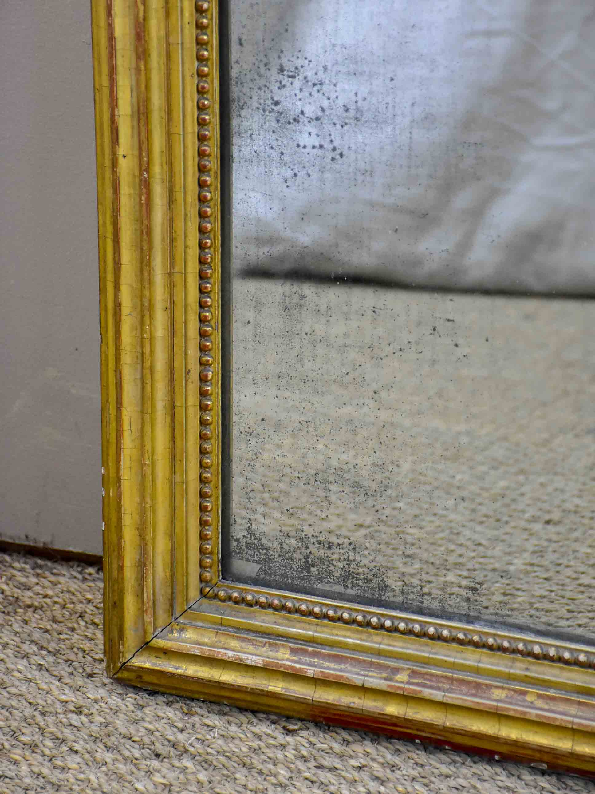 Large French Louis Philippe mirror with aged glass