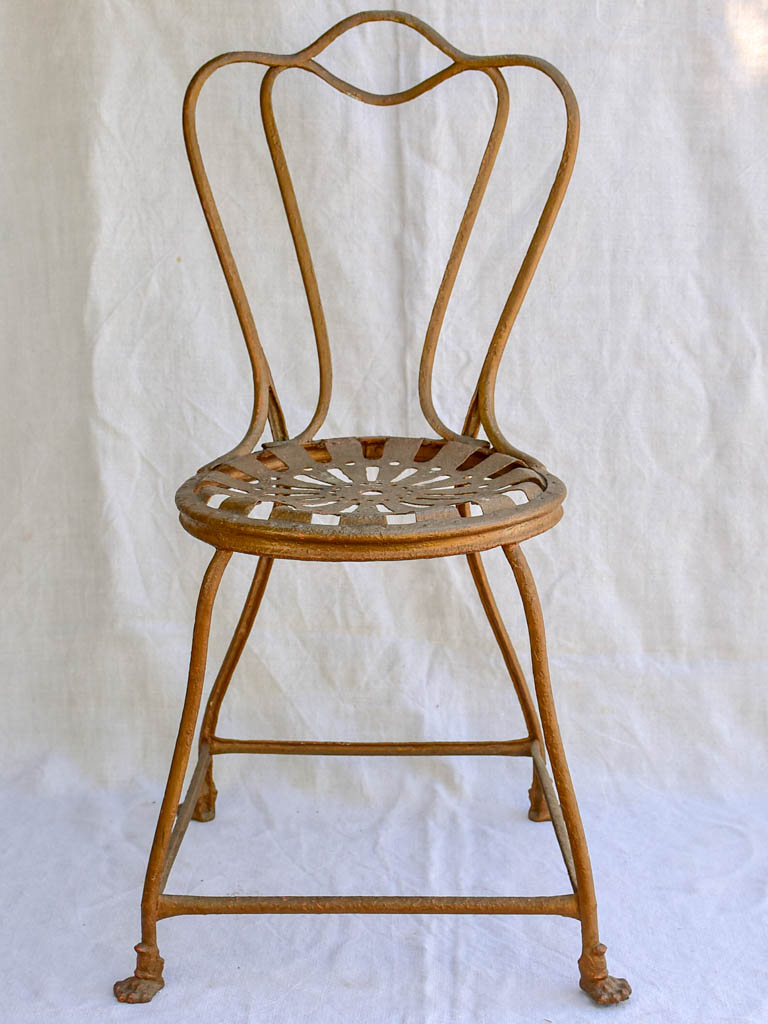 19th century French iron garden chair from Arras with lions claw feet