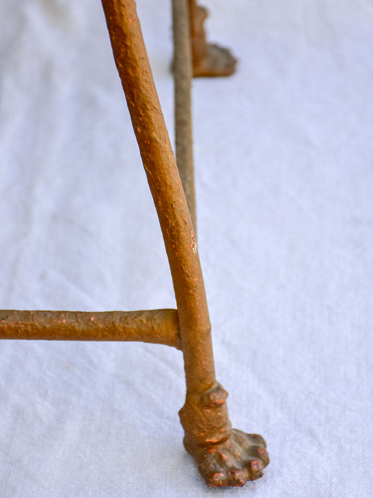 19th century French iron garden chair from Arras with lions claw feet