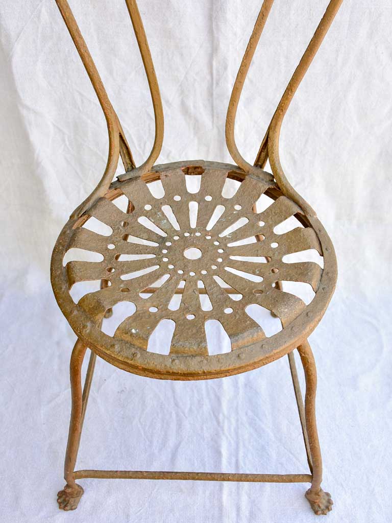 19th century French iron garden chair from Arras with lions claw feet