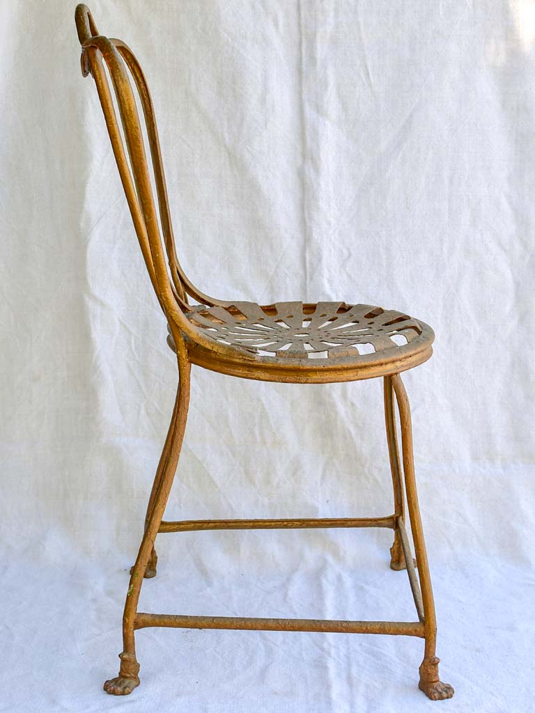 19th century French iron garden chair from Arras with lions claw feet