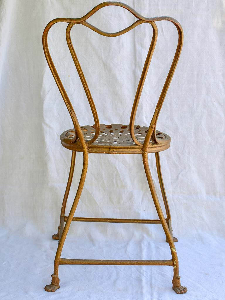 19th century French iron garden chair from Arras with lions claw feet