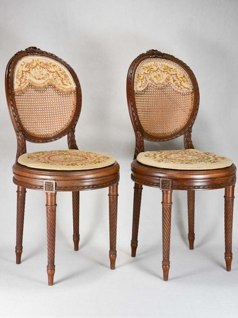 Louis XVI-style armchairs with cross-stitch upholstery