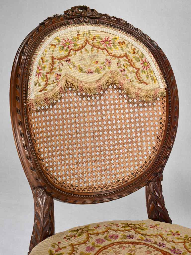 Louis XVI-style armchairs with cross-stitch upholstery