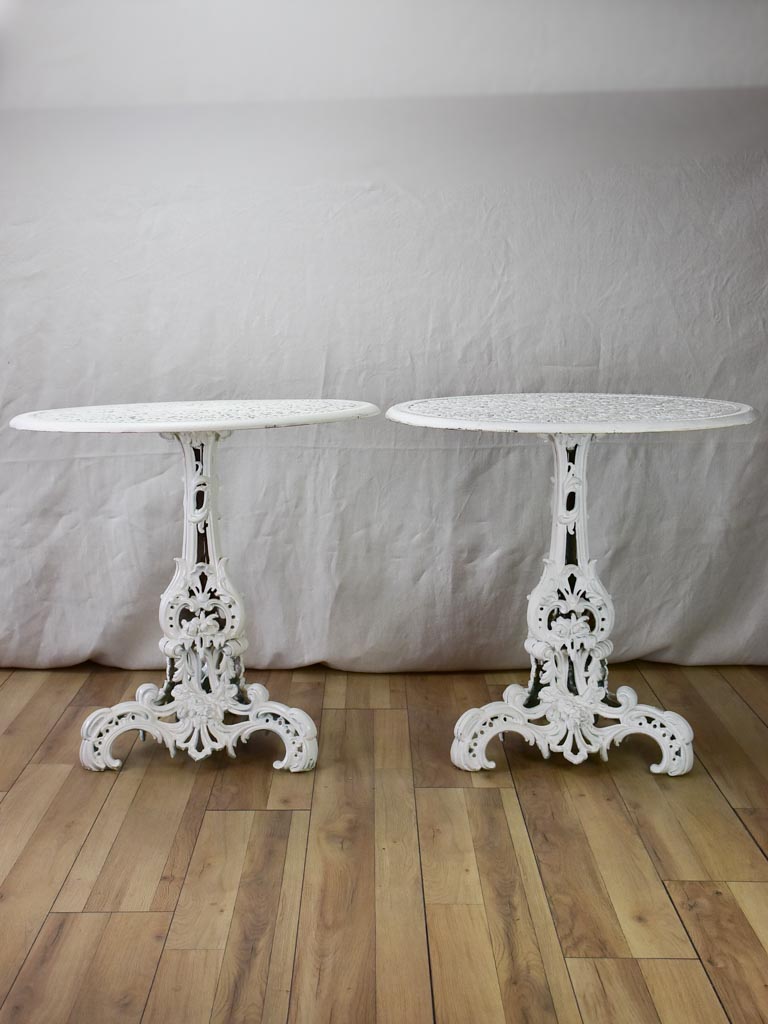 Pair of white English cast-iron garden tables