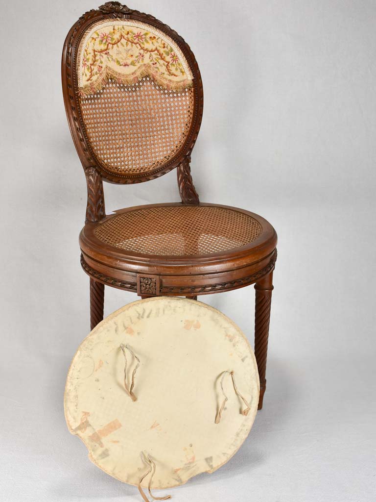 Louis XVI-style armchairs with cross-stitch upholstery