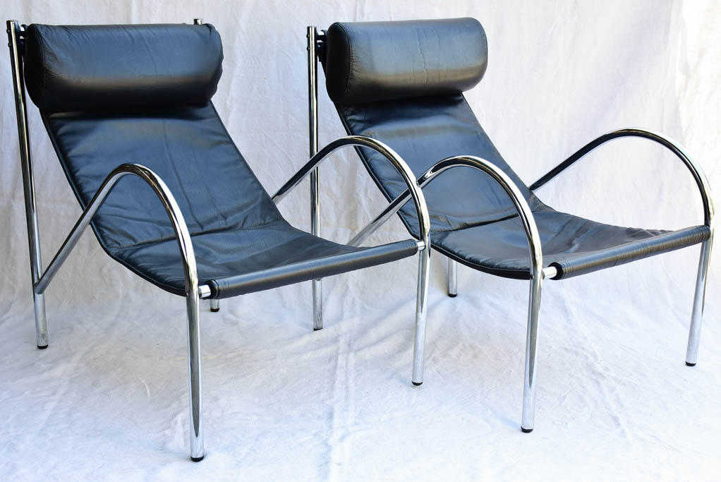 Pair of 1950's black leather and chrome armchairs in the style of Le Corbusier Charlotte Perriand