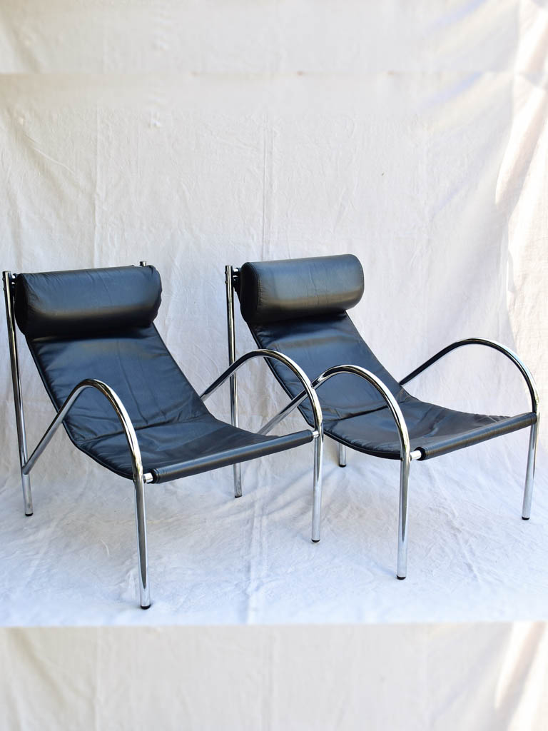 Pair of 1950's black leather and chrome armchairs in the style of Le Corbusier Charlotte Perriand