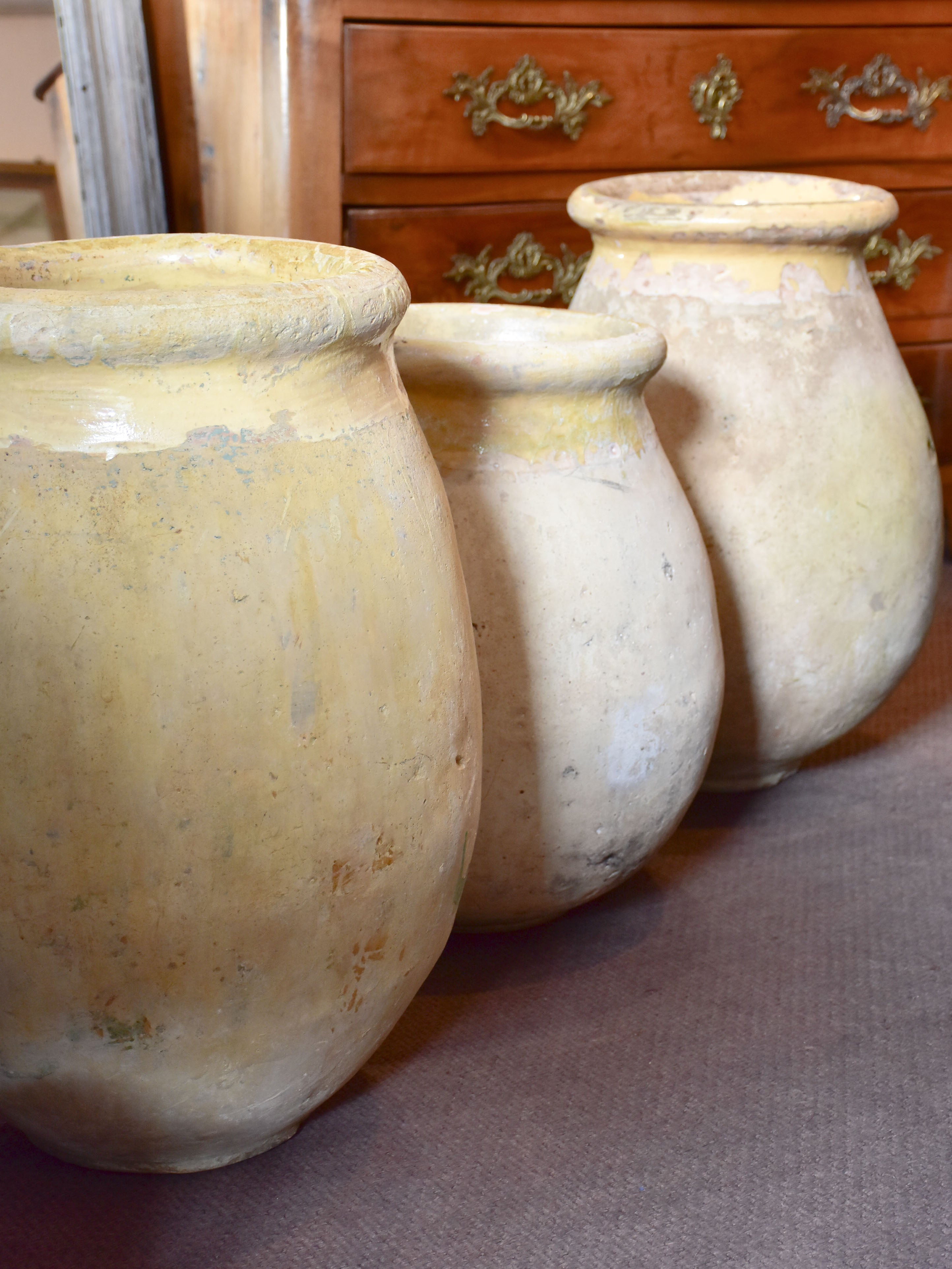 Collection of three antique biot jars