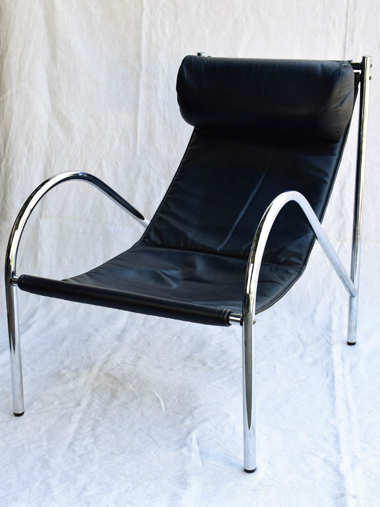 Pair of 1950's black leather and chrome armchairs in the style of Le Corbusier Charlotte Perriand