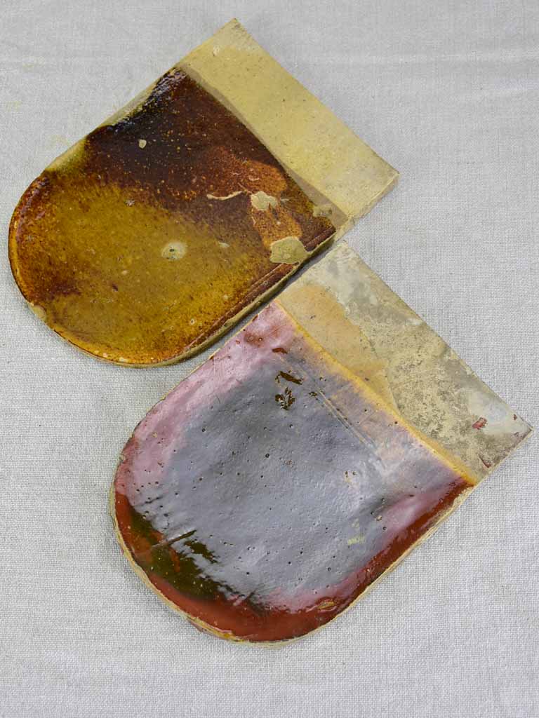 Two antique French glazed roof tiles from Burgundy