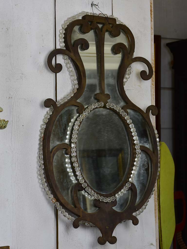 Pair of early 19th-century wrought iron Italian mirrors with beading