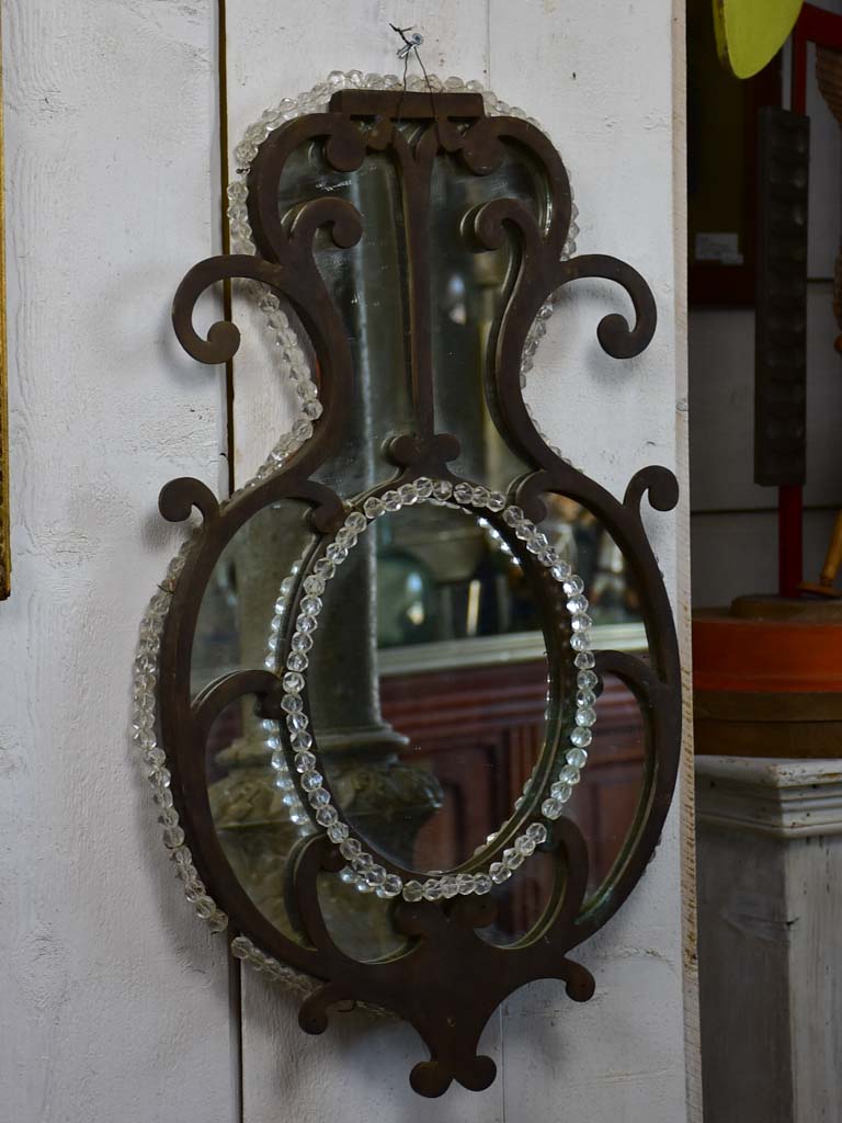 Pair of early 19th Century wrought iron Italian mirrors with beading