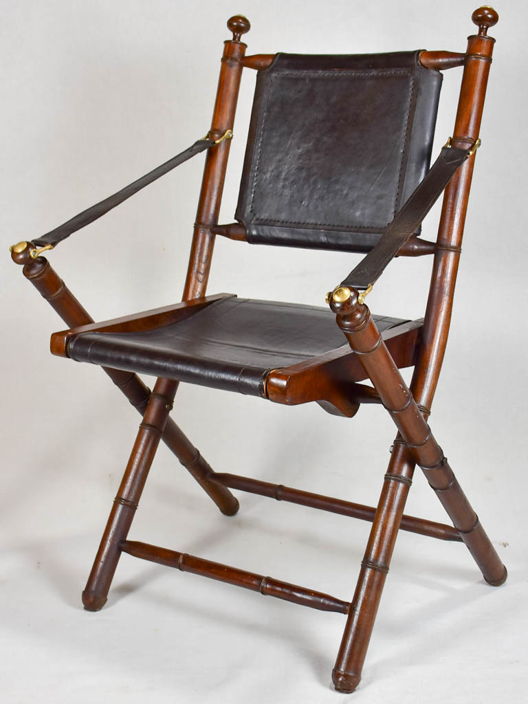 Set of 4 Colonial style folding leather armchairs