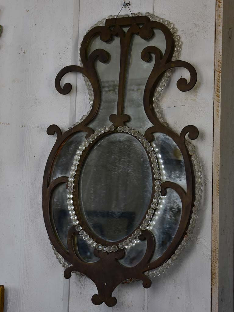 Pair of early 19th-century wrought iron Italian mirrors with beading